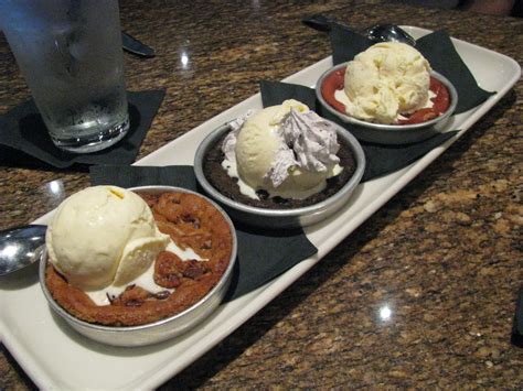 Pizookie tuesday - Beat eggs and vanilla into sugar mixture. In another bowl, whisk together flour, baking soda and salt; gradually beat into sugar mixture. Stir in chocolate chips and pecans. Spread mixture into buttered skillet. …